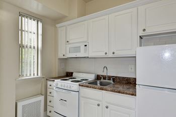 Modern Kitchen With White Cabinet at Majestic, Washington, Washington